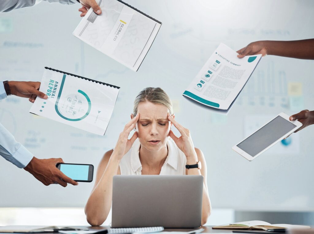 Stress, anxiety and business woman working under pressure with mental health burnout in busy, task