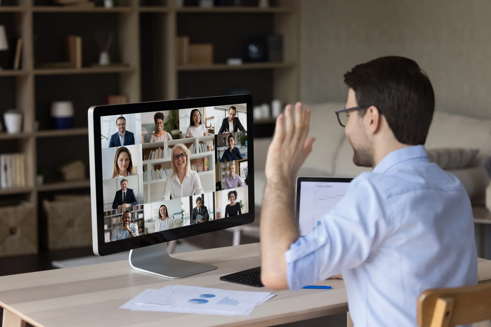 A colleague joining a team video meeting from home